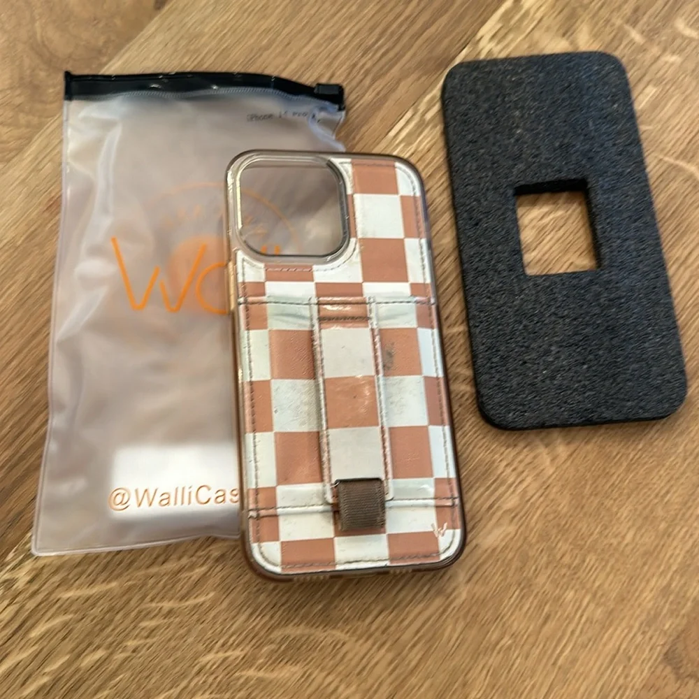 Walli Ohone case! I phone 14 pro max. Has wear but still works great!